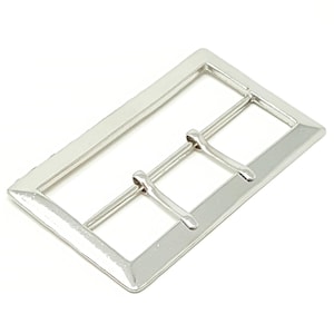 May include: A silver metal buckle with three prongs. The buckle is rectangular with rounded corners.