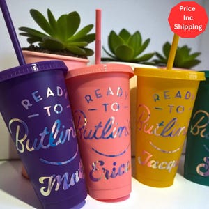 May include: A set of three ceramic mugs with a speckled, matte finish in cream, light grey, and dark grey. Each mug has a simple, minimalist design, suitable for coffee or tea.