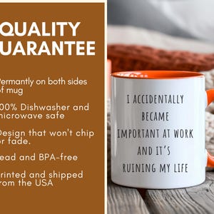 May include: White ceramic mug with an orange interior and handle. The mug features the text "I ACCIDENTALLY BECAME IMPORTANT AT WORK AND IT'S RUINING MY LIFE" in black. The mug is on a wooden surface.