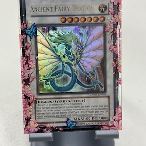Mangas con borde Mangas superiores Flor de cerezo Demon Slayer Nezuko Yugioh Rosa Lindo (60 mangas)