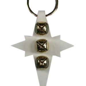 May include: White star-shaped keychain with three gold jingle bells. The keychain has a metal ring for attaching to keys.