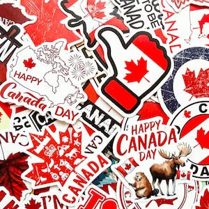 May include: A selection of red and white Canada Day stickers. Designs include maple leaves, the Canadian flag, a map of Canada, and the words "Happy Canada Day". Some stickers feature a moose and a beaver.