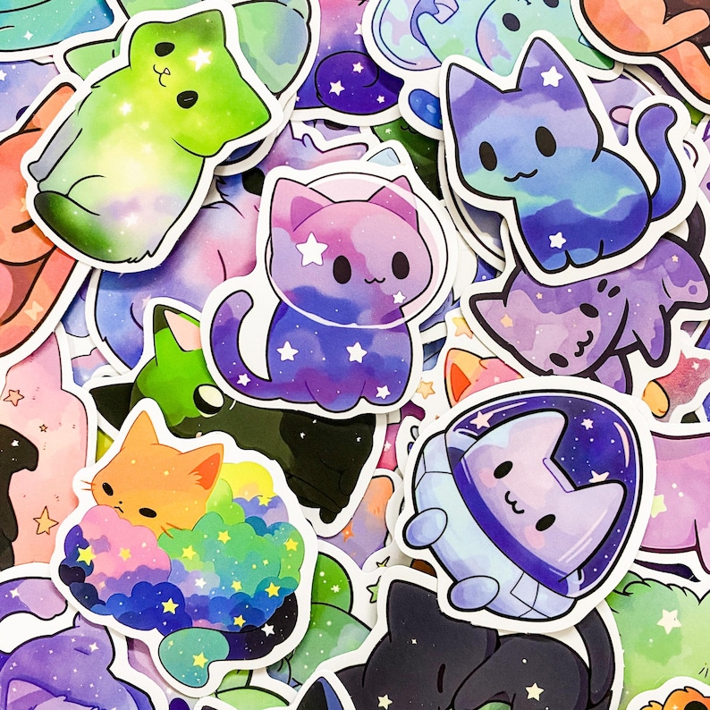 May include: A collection of colorful cat stickers with galaxy and space themes. The stickers feature cats in various poses, including sitting, sleeping, and wearing astronaut helmets. The stickers are perfect for adding a touch of whimsy to laptops, water bottles, and other surfaces.