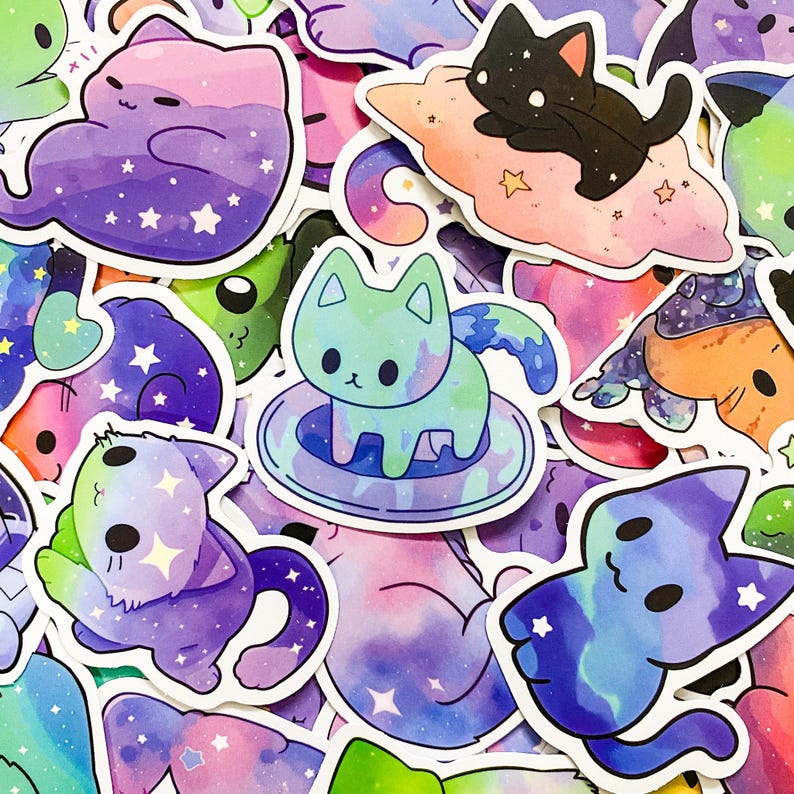 May include: A collection of colorful cat stickers with galaxy and star designs. The stickers feature cats in various poses, including sleeping on a cloud, swimming in a pool, and sitting on a plate. The stickers are perfect for adding a touch of whimsy to laptops, water bottles, and other surfaces.