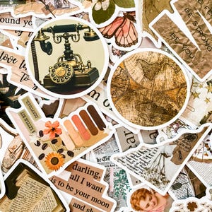 May include: A collection of vintage-style stickers featuring a rotary phone, a world map, flowers, and text that reads "Be Strong, Be You".