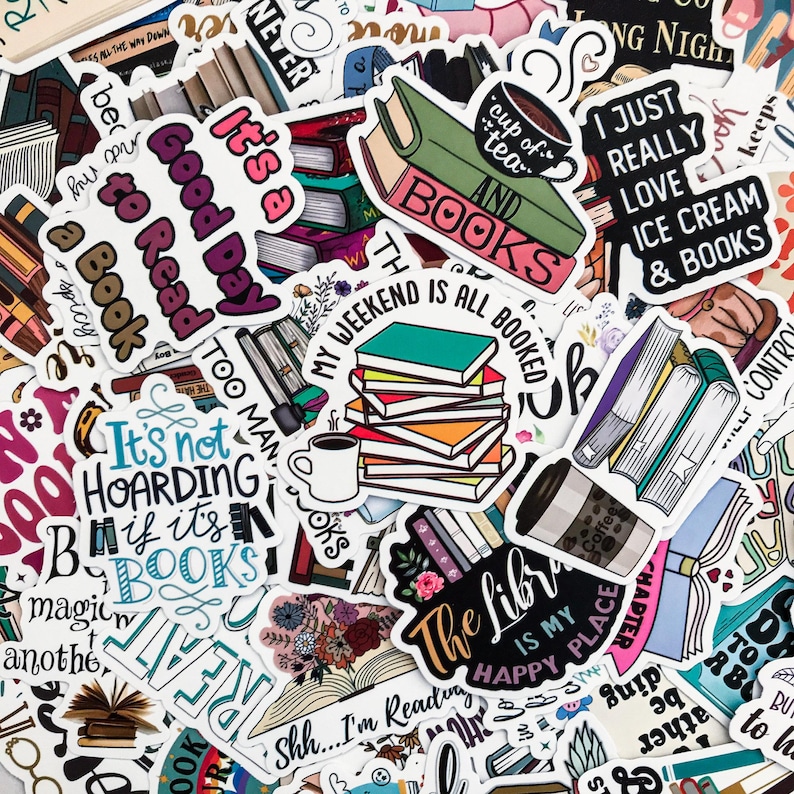 May include: A collection of colorful stickers with book-themed designs. The stickers feature images of books, coffee cups, and phrases like "It's a Good Day to Read a Book" and "The Library is My Happy Place."