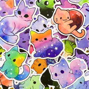 May include: A collection of colorful cat stickers with galaxy and star designs. The stickers are made of a glossy vinyl material and are perfect for decorating laptops, water bottles, journals, and more.
