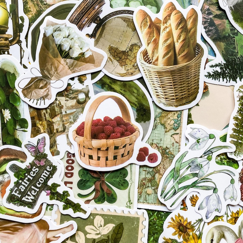 May include: A collection of colorful stickers featuring various designs, including a globe, a basket of bread, a bouquet of flowers, a basket of raspberries, a butterfly, and a clover. The stickers are perfect for adding a touch of whimsy to journals, planners, and other craft projects.