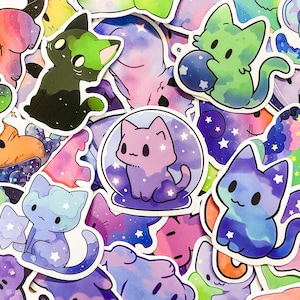 May include: A collection of colorful cat stickers with galaxy and space themes. The stickers feature different cat poses and designs, including a cat in a snow globe, a cat with a galaxy tail, and a cat with a galaxy head. The stickers are perfect for adding a touch of whimsy to laptops, water bottles, journals, and more.