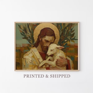 May include: A framed print of a religious painting. The artwork depicts a figure with a golden halo embracing a lamb. The figure has long brown hair and a beard. The background features olive branches and a landscape. The text "PRINTED & SHIPPED" is at the bottom.