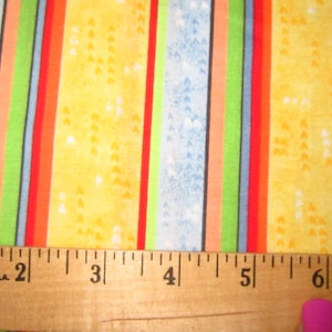 Colorful striped print cotton fabric with little hearts sold by the half yard