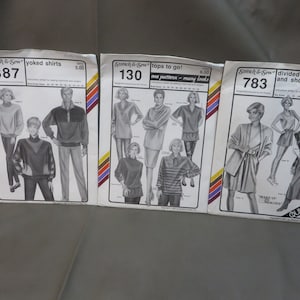 May include: Three sewing patterns for tops and skirts. The patterns are for yoked shirts, tops to go, and a divided skirt and shorts. The patterns are from Stretch & Sew and feature illustrations of women wearing the garments.