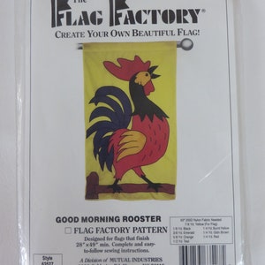 May include: A sewing pattern for a Good Morning Rooster flag. The pattern includes instructions for a 28 by 49 inch flag and a list of fabric needed in yards. The pattern is from The Flag Factory, a division of Mutual Industries.