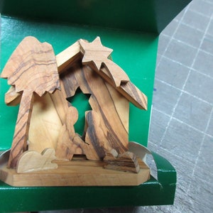 Handcrafted Olive Wood Nativity Scene ornament from the Holy Land.