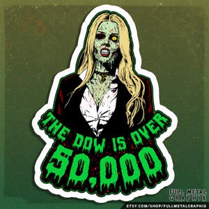 May include: A sticker featuring a zombie woman with blonde hair, wearing a black blazer and white shirt. The text "THE DOW IS OVER 50,000" is in green, dripping letters. The sticker has a white border and a green background.