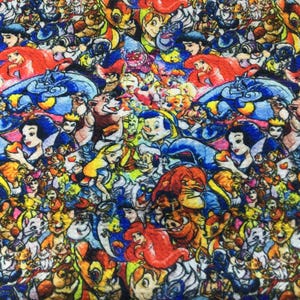 May include: A vibrant fabric featuring a collage of colorful cartoon characters. The design includes various Disney characters such as Snow White, Ariel, and Beast. The artwork is detailed with bold outlines and a variety of colors, creating a playful and eye-catching pattern.