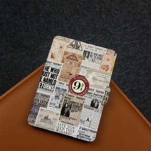 May include: A rectangular phone case featuring a collage of newspaper clippings with the words "Daily Prophet" and "Platform 9 3/4". The case has a brown and beige color scheme with various images and text.