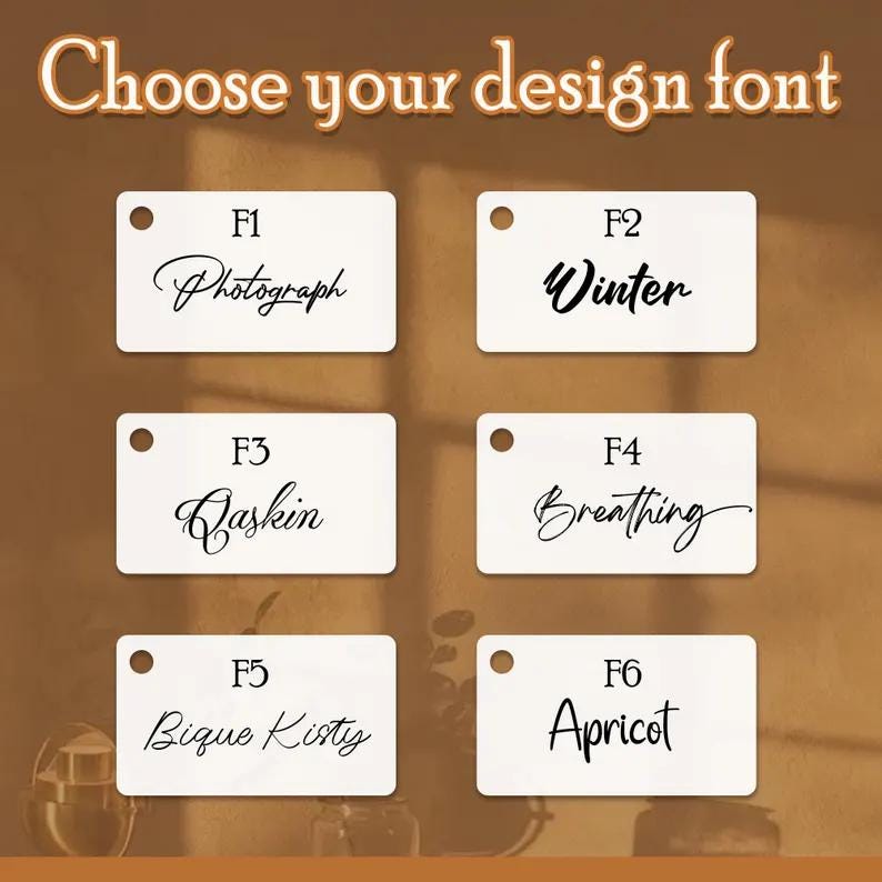 May include: Image showcasing six white rectangular tags with different font styles. Each tag has a hole at the top and features a unique font sample with a corresponding label (F1-F6). The text "Choose your design font" is at the top.