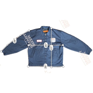 May include: A blue work jacket with a zipper closure, two front pockets, and a collar. The jacket has a name tag and a patch that says "Atlas". The jacket measures 25 inches across the chest, 27 inches in length, and 29 inches for the sleeve length.