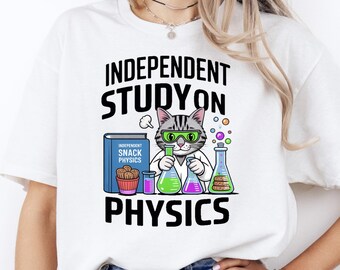 May include: White t-shirt with a graphic of a cat wearing glasses and a lab coat, holding beakers. The text reads "INDEPENDENT STUDY ON PHYSICS" with a book titled "INDEPENDENT SNACK PHYSICS".