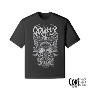 May include: Black t-shirt featuring a detailed, gray graphic of skulls, horns, and tentacles, with the word "CARNIFEX" above. The design includes the text "CLOTHING" below the skulls and the brand logo "COREPSE CLOTHING" at the bottom right.