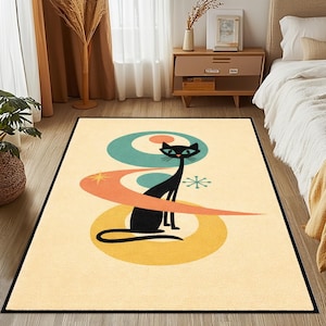 May include: A rectangular area rug with a mid-century modern design. The rug features a black cat illustration with a long neck, set against a cream background with teal, orange, and yellow geometric shapes. The rug has a black border.