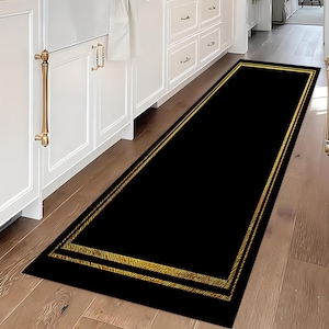 Wasbaar zwart-gouden loper: modern design