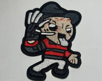 フレディ アイロン パッチ | 帽子、ジャケット、セーター、トートバッグ、デニムなどに使える Springwood スラッシャー パッチ。