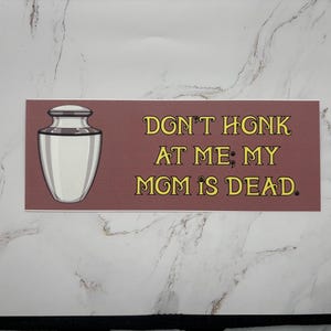 Bumper Sticker: Don’t honk at me; my mom/dad is dead
