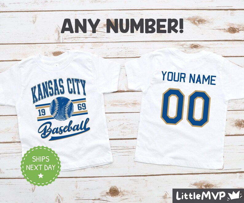 two white shirts with kansas city baseball on them