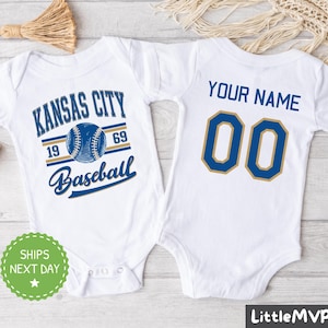 two baby onesuits with kansas city baseball on them