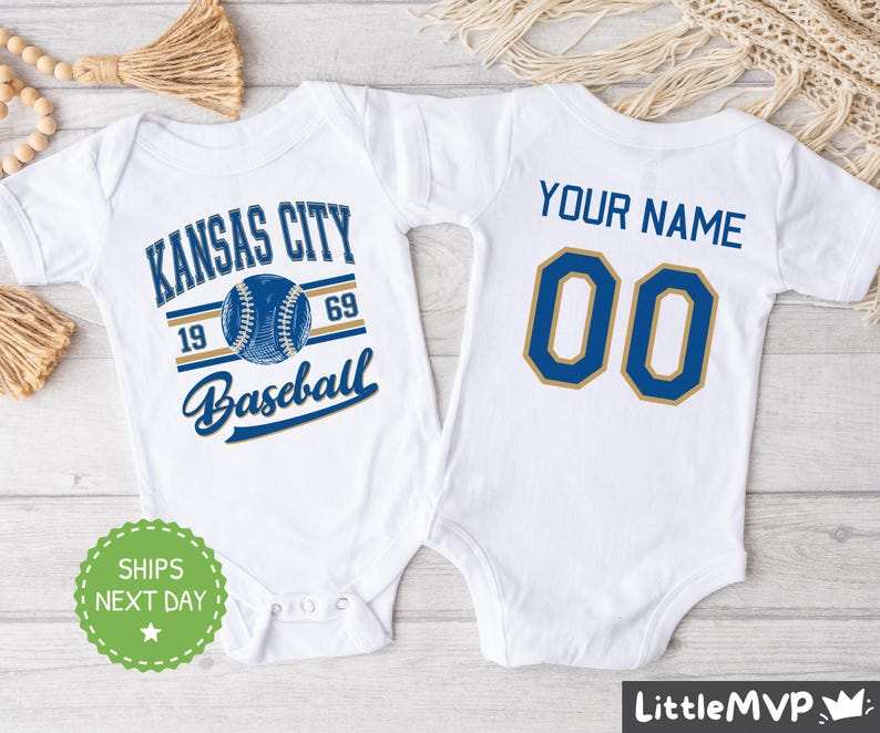 two baby onesuits with kansas city baseball on them