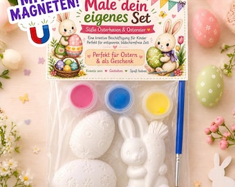 Puede incluir: Un kit de manualidades de Pascua con el texto "Male dein eigenes Set". El kit incluye botes de pintura rosa, azul y amarillo, figuras de conejos y huevos blancos, y un pincel. El embalaje presenta ilustraciones de conejos y huevos decorados.