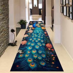 May include: A blue and green peacock with its tail feathers spread out in a fan shape. The peacock is surrounded by pink, white, and purple flowers on a dark blue background. This is a runner rug.