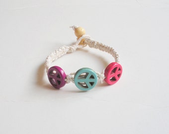 White Hemp Bracelet with Pink, Turquoise and Purple Peace Sign Beads ready to ship.