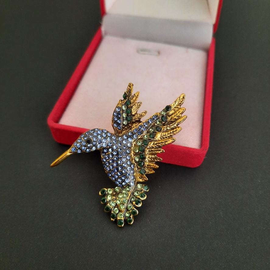 Anita Potters juwelier antiquair | Gouden vintage broche paradijsvogel