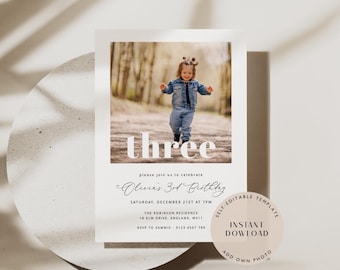 May include: A printable birthday invitation with a photo of a child in a blue denim jacket and jeans. The invitation says "three" in large white letters and "Olivia's 3rd Birthday" in cursive script. The invitation also includes the date, time, and location of the party, as well as the RSVP information. The invitation is decorated with a brown circle that says "Self-Editable Template" and "Instant Download" in white text.