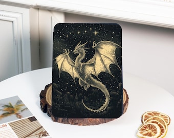 May include: A black tablet case with a detailed illustration of a dragon with outstretched wings against a starry night sky. The dragon is depicted in shades of gold and cream, with intricate scales and wing details. The case is displayed on a wooden base.