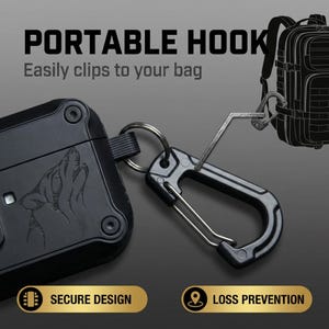May include: Black portable hook with a carabiner clip, designed to easily attach to a bag. The hook features the text "PORTABLE HOOK" and "Easily clips to your bag". The design includes a wolf graphic and the words "SECURE DESIGN" and "LOSS PREVENTION".