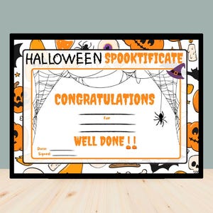May include: A printable Halloween Spooktificate certificate with a black spider web design, orange pumpkins, and a witch's hat. The text reads "Halloween Spooktificate", "Congratulations", "For", "Well Done!!", "Date", and "Signed".