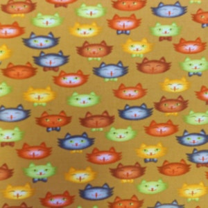 Pretty Kitty Fabric from Blank Quilting Multi-Colored Cats on a Mocha Background