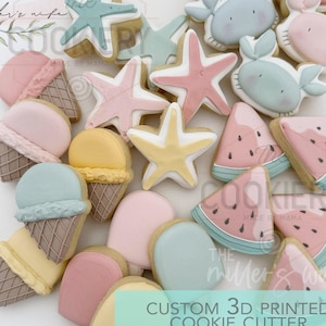 May include: A collection of custom 3D printed cookie cutters in the shape of ice cream cones, popsicles, starfish, crabs, and watermelon slices. The cookies are decorated with pastel colors, including pink, yellow, and blue. The text "CUSTOM 3D PRINTED COOKIE CUTTER" is visible.