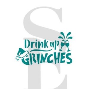 May include: A white stencil design with the words "Drink up Grinches" in teal script. The design includes a Santa hat and two wine glasses clinking together. The letter "S" and "E" are in the background.