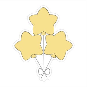 May include: A sticker featuring three star-shaped balloons in a light yellow color, each with a white outline. The balloons are tied together with black strings and a bow, set against a white background.