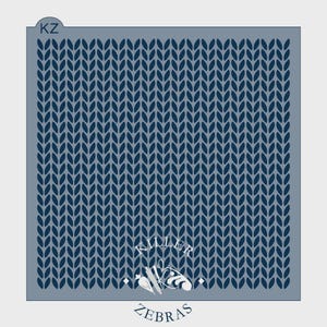 May include: A navy blue stencil with a knit pattern design. The stencil has a rectangular shape with rounded corners. The words "KILLER ZEBRAS" are printed at the bottom of the stencil.