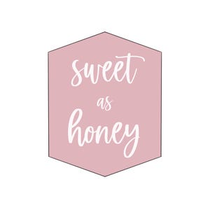 May include: A pink hexagonal sign with the words "sweet as honey" in white cursive script. The sign has a simple, clean design, perfect for home decor or a gift.