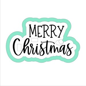 May include: A white background with a teal outline and the words "MERRY Christmas" in black script. The text is in a cloud-like shape, perfect for holiday-themed crafts and decorations.