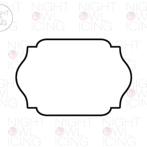 May include: A black cookie cutter in the shape of a decorative plaque. The cutter has a thick black outline and a white interior. The words "NIGHT OWL ICING" are in a circle in the upper left corner.