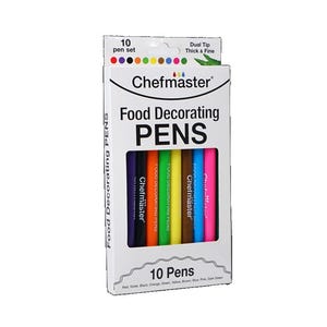 May include: A box set of Chefmaster food decorating pens. The box is white with the words "Food Decorating PENS" in large, bold letters. The set includes 10 pens in various colors, including red, violet, black, orange, green, yellow, brown, blue, pink, and dark green.