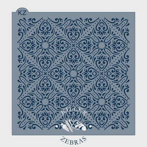 May include: A square stencil with a repeating ornate pattern in navy blue on a gray background. The design features floral and heart-shaped elements. The text "KILLER ZEBRA" is at the bottom.
